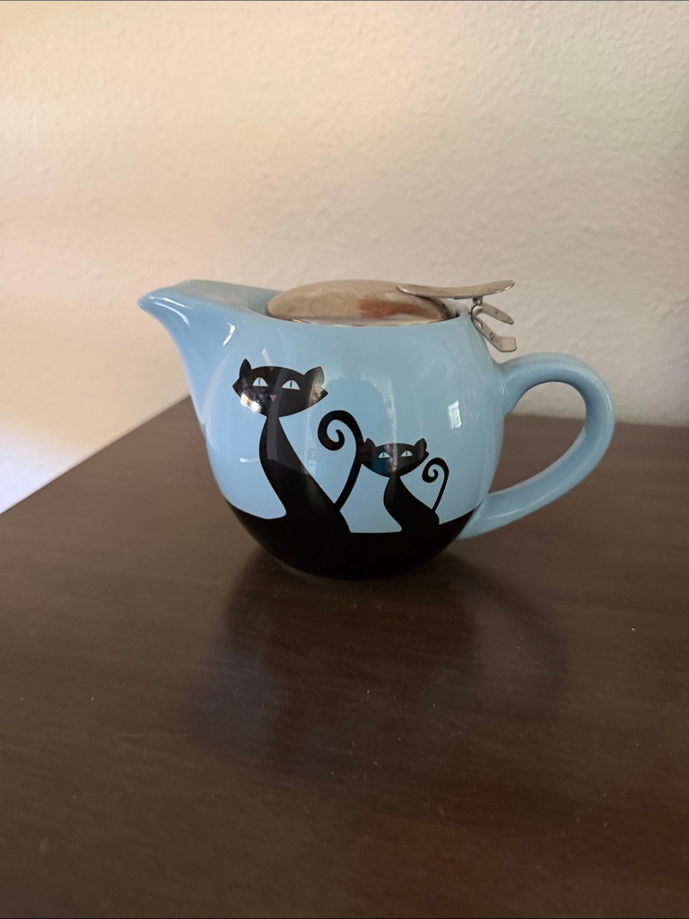 Light Blue Ceramic Teapot with Black Cat Design and Stainless Infuser